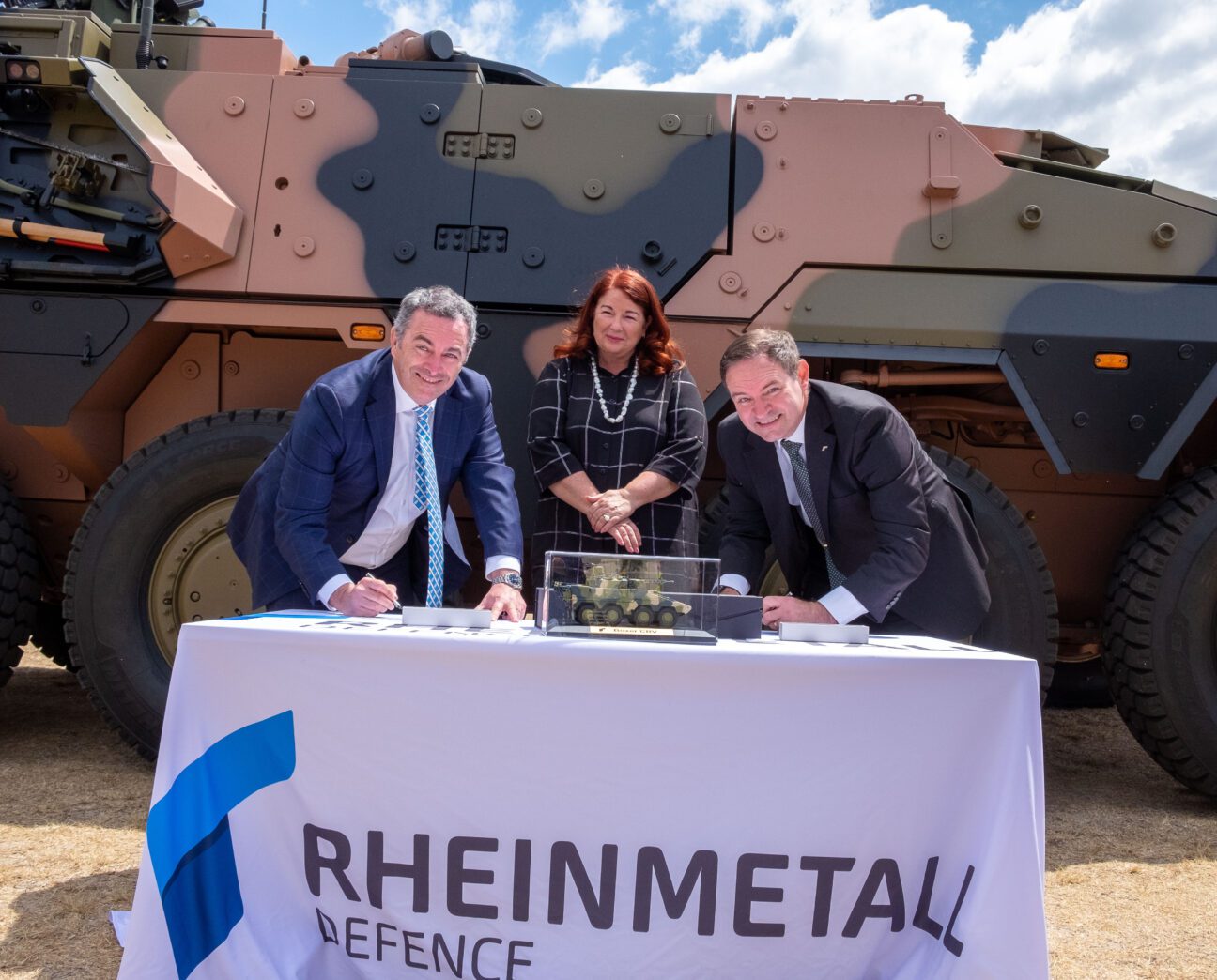 Supacat Managing Director Asia Pacific - Michael Halloran, Managing Director of Rheinmetall Defence Australia - Mr Gary Stewart and Minister for Defence Industry - Hon Melissa Price signing a certificate recognising our contribution to the delivery of the first BOXER Combat Reconnaissance Vehicle to the Commonwealth of Australia.